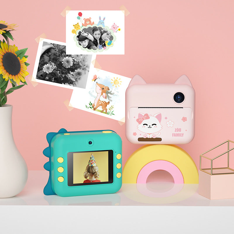 Children's Digital Camera: 1080P video, 12MP photos, adjustable focal length. USB rechargeable for 2hrs video, 2000+ photos, and 400 prints. Cute design, safe ABS material, 2.4" screen. Versatile for selfies, parties, education, travel.