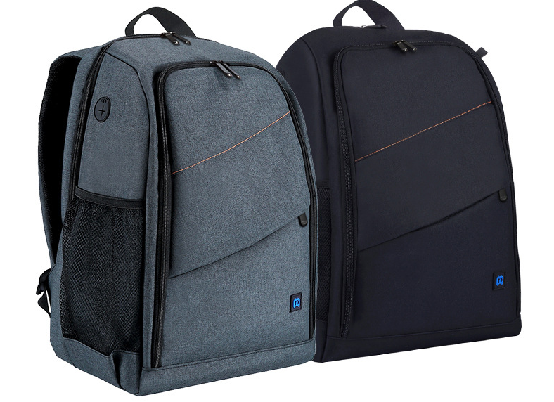 PULUZ Outdoor Camera Backpack - Professional storage for sports essentials. Comfortable handles, spacious, waterproof, and wear-resistant. Ideal for DSLR, lenses, and accessories. Multiple pockets for organization. Perfect for outdoor adventures.